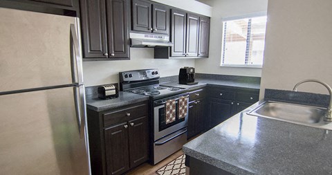 Beautifully designed kitchen inside your apartment home at The Reserves of Melbourne in Melbourne, FL